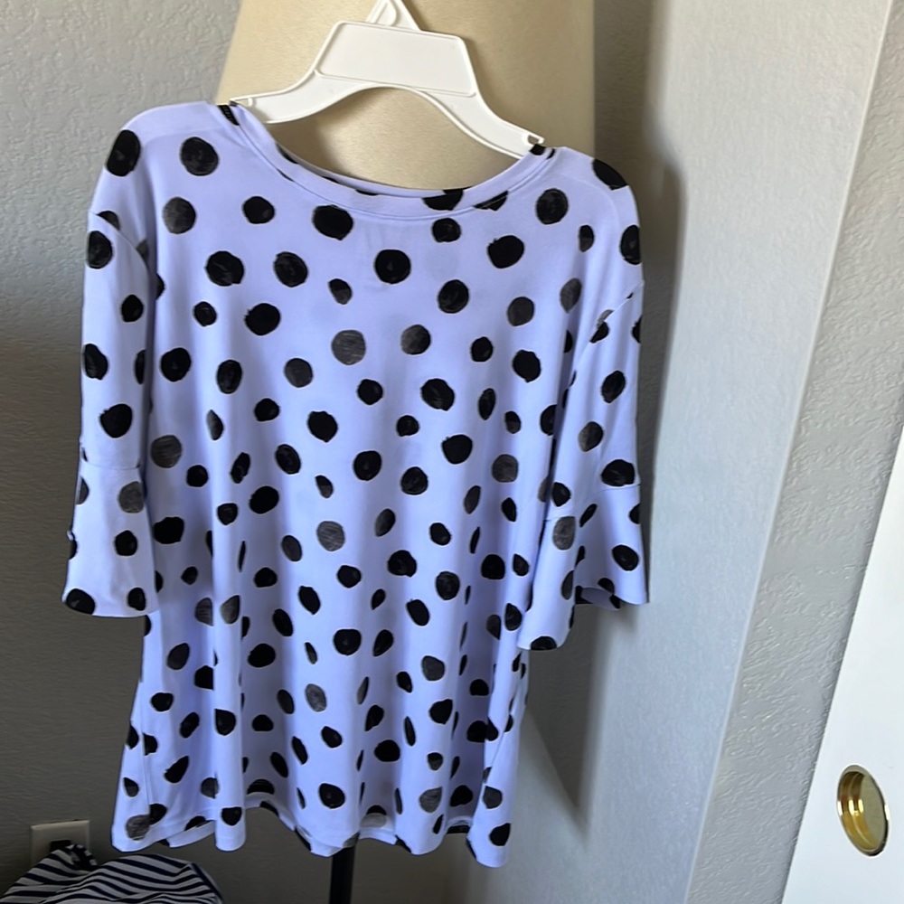 Darling periwinkle and black polka-dot blouse.